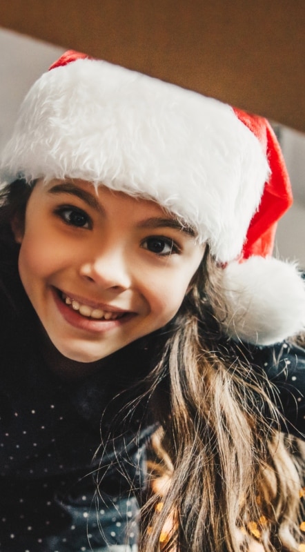 girl looking into box vertical