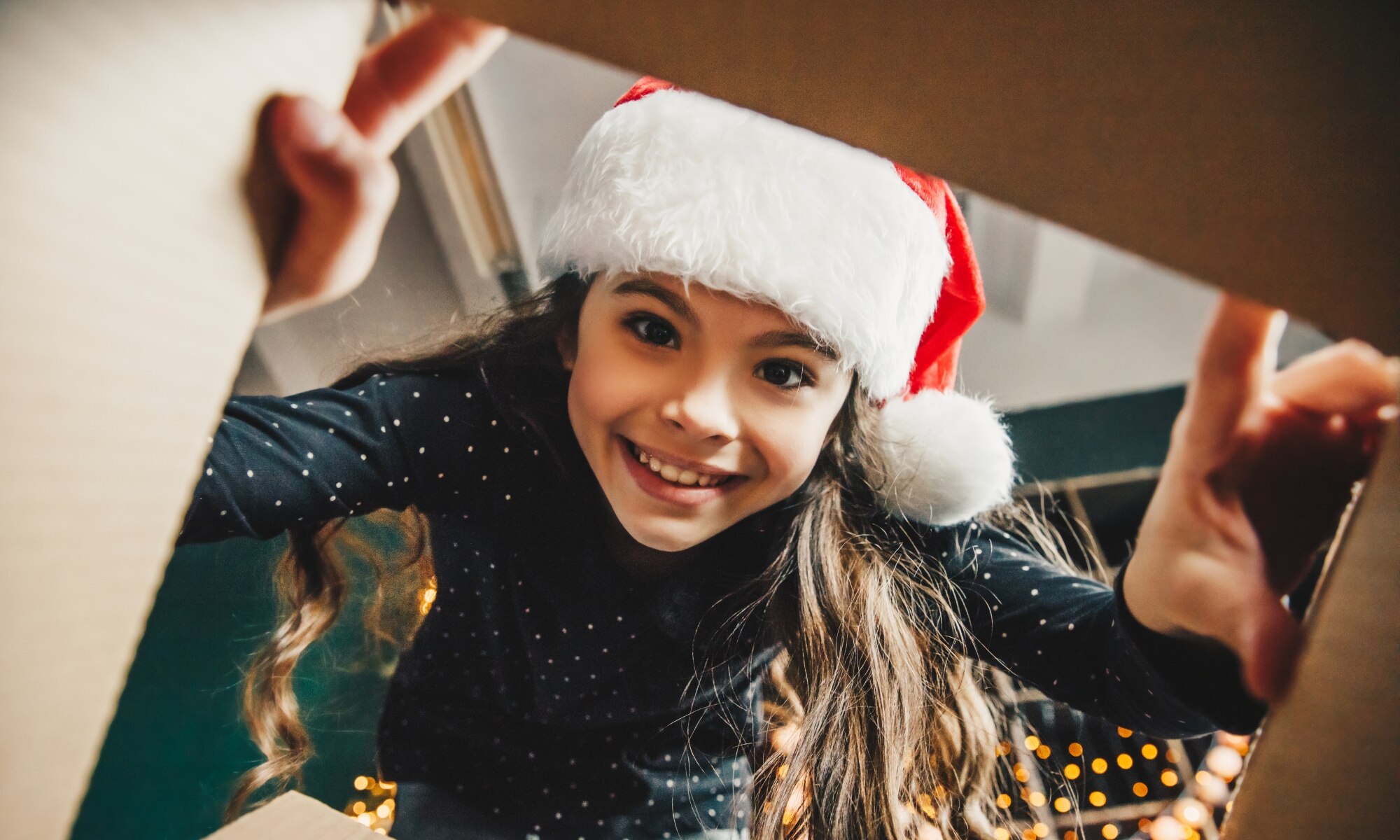 girl looking into box