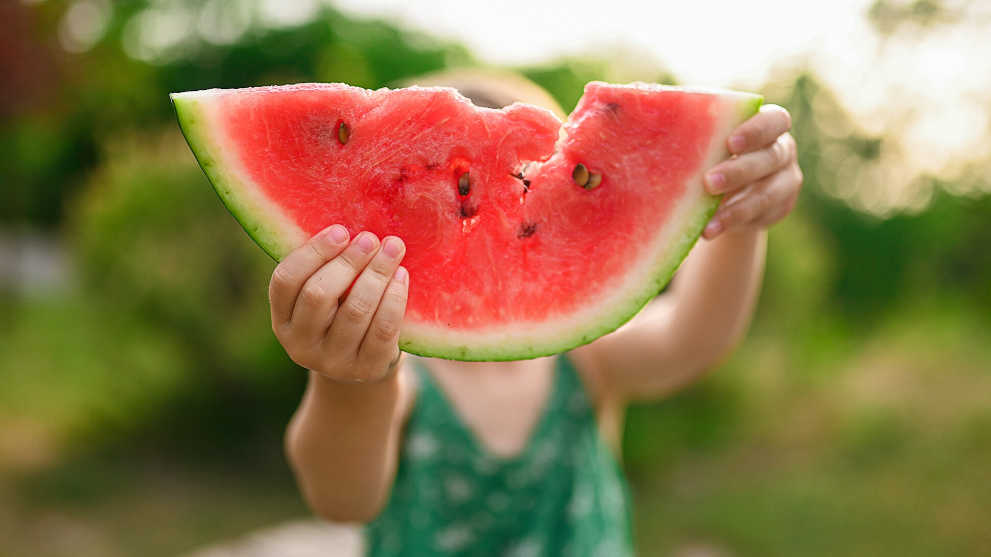 Kind mit Wassermelone