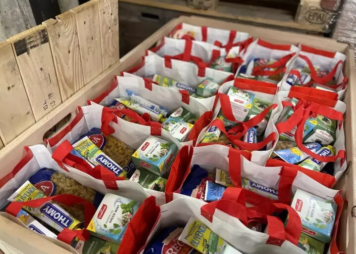 Lebensmittel-Taschen für Caritas Waadt